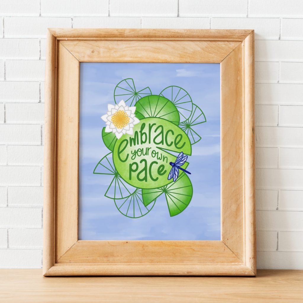 Embrace your own pace quote art print in a wooden frame