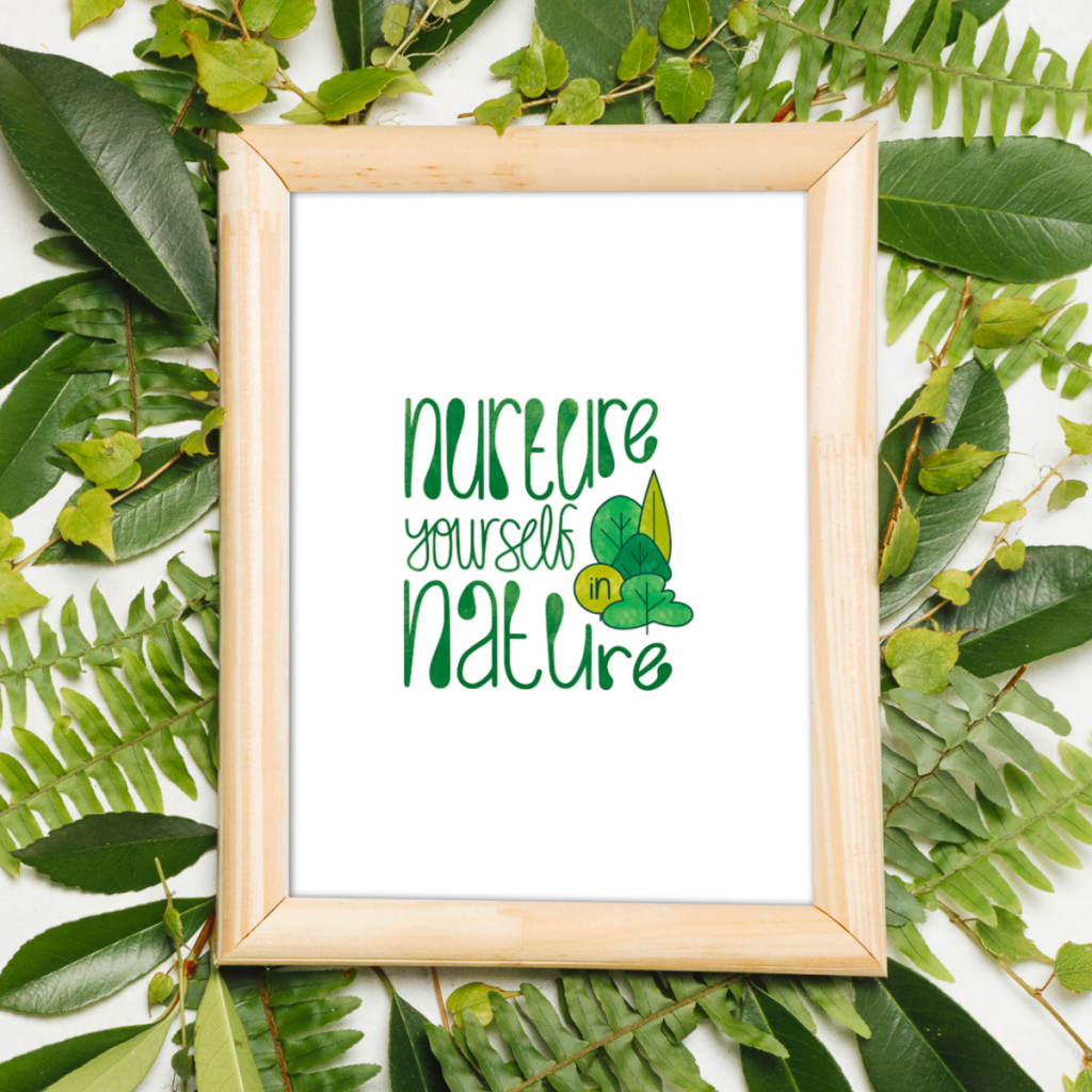 Nurture yourself in Nature quote art print in a wooden frame